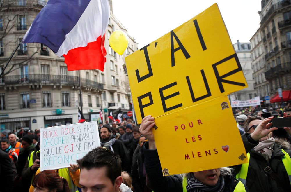 A protester holds a banner during a demonstration during the 31st consecutive day of strike against French governmentu00e2u20acu2122s pensions reform plans in Paris, January 4, 2020. The banner reads u00e2u20acu02dcIu00e2u20acu2122m afraid about my relativesu00e2u20acu2122. u00e2u20acu201d Reuters pic