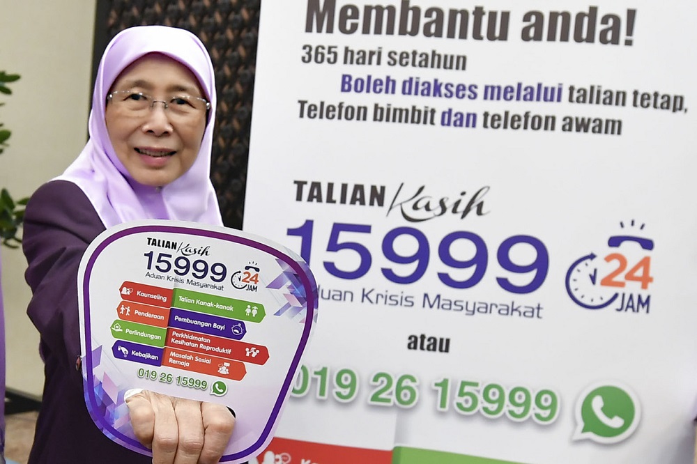 Deputy Prime Minister Dr Wan Azizah Wan Ismail, who is also Women, Family and Community Development minister, poses for a photo during the ministryu00e2u20acu2122s monthly assembly in Putrajaya January 30, 2020. u00e2u20acu201d Bernama pic