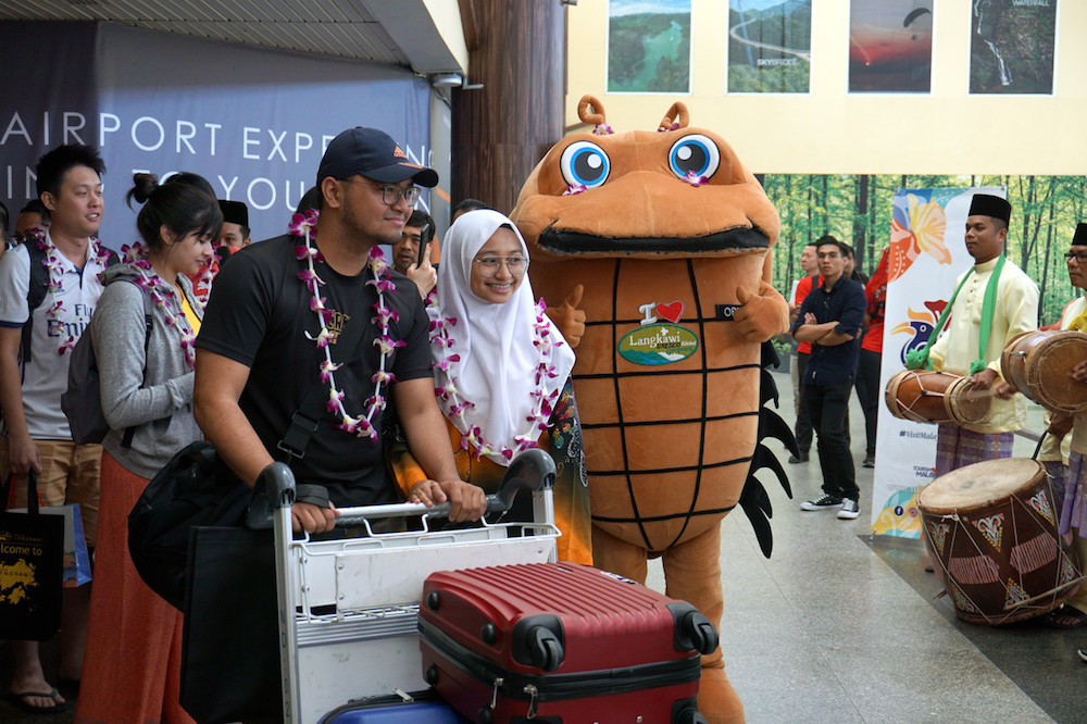 Langkawi Unesco Global Geoparku00e2u20acu2122s mascot, Orbit, greets passengers at Langkawi International Airport January 1, 2020. u00e2u20acu201d Bernama pic 