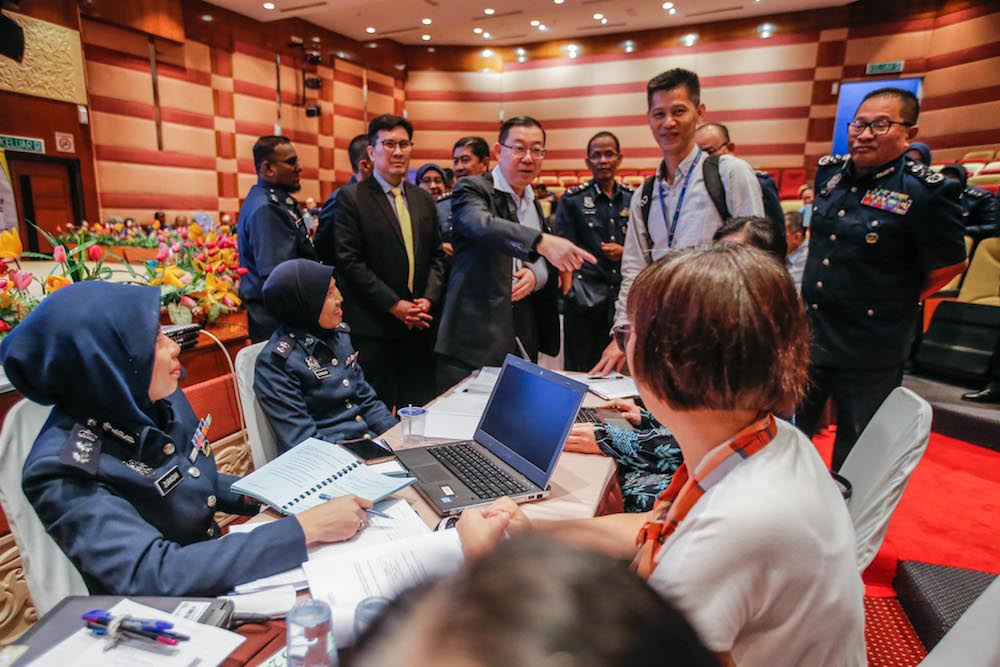 Finance Minister Lim Guan Eng speaks to people during u00e2u20acu02dcMeet the Customer Dayu00e2u20acu2122 at the WPKL Customs Complex in Kelana Jaya January 9, 2020. u00e2u20acu201d Picture by Hari Anggara