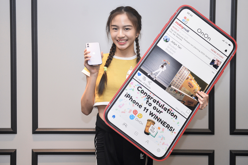 Tan is a dancer-in-the-making and is excited to film choreography videos using her new prize. u00e2u20acu201d Picture by Miera Zulyana