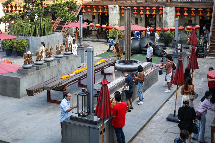 Red lanterns and incense imbue Lhong 1919 in Bangkok with a festive Lunar New Year spirit
