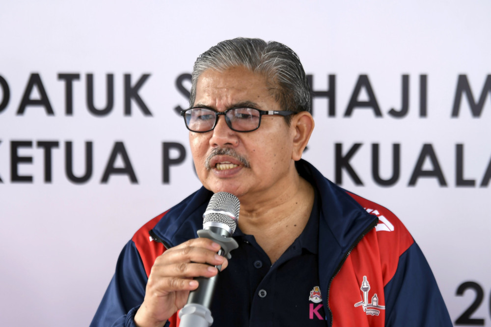 Kuala Lumpur police chief Datuk Seri Mazlan Lazim gives a speech at Perumahan Awam Seri Perak, Sentul, January 11, 2020. u00e2u20acu201d Bernama pic 