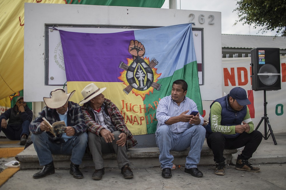 Indigenous activists hold a protest outside the ministry of well-being in the city of Morelia, Michoacan, Mexico November 26, 2019. u00e2u20acu201d Thomson Reuters Foundation pic