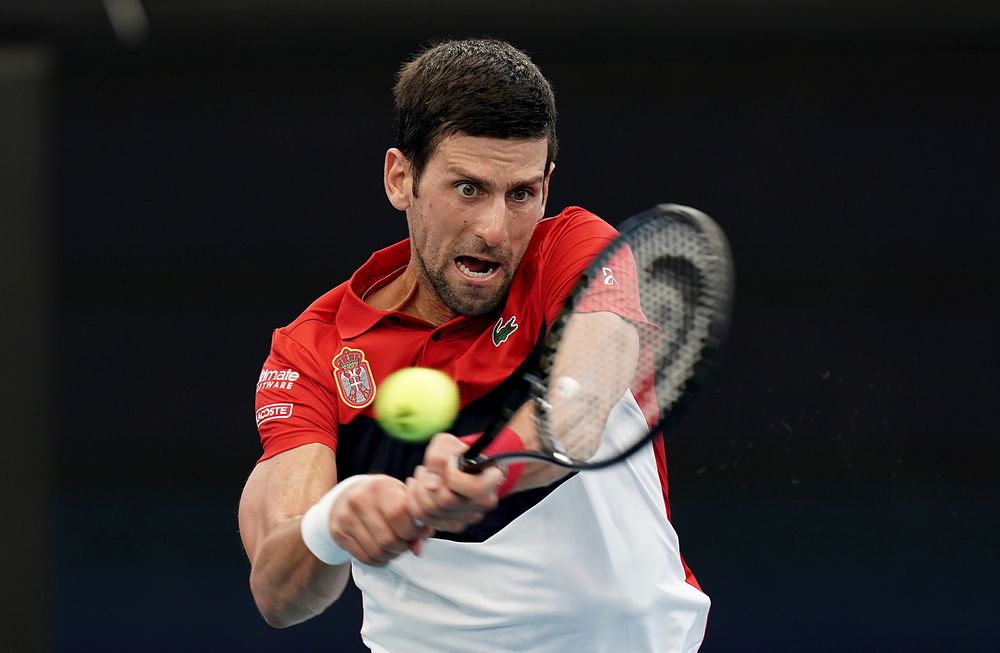 Novak Djokovic of Serbia returns during his singles match against Cristian Garin of Chile on day 6 of the ATP Cup tournament at Pat Rafter Arena in Brisbane, Australia, January 8, 2020. u00e2u20acu201d AAP Image/Dave Hunt/via Reuters