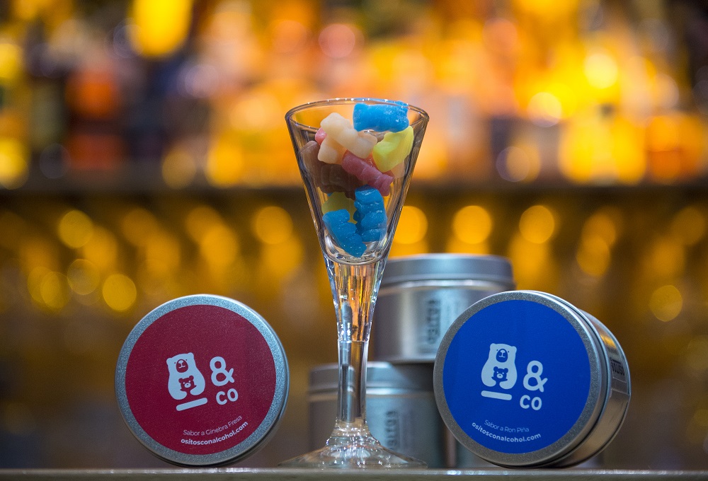 Cans and a glass full of Ositos & Co alcohol-infused gummy bears are pictured at a bar in the Spanish Basque city of Bilbao January 19, 2020. — AFP pic