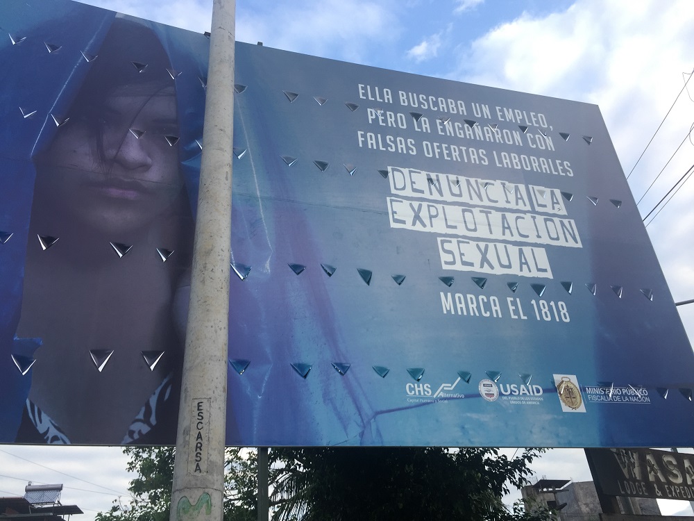 A poster warns of the dangers of false offers of work and child sexual exploitation, Puerto Maldonado, Peru November 29, 2019. u00e2u20acu2022 Thomson Reuters Foundation pic