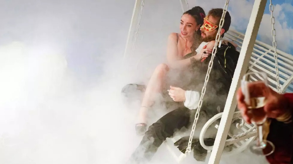 A couple poses during a masked ball in Paris October 18, 2019. u00e2u20acu201d AFP pic