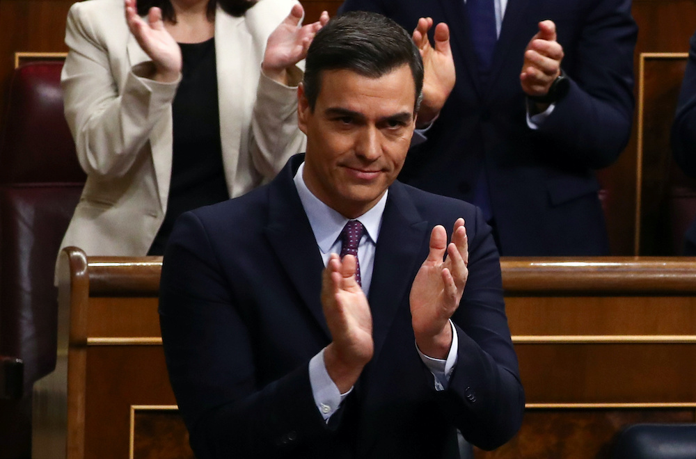 Spainu00e2u20acu2122s acting Prime Minister Pedro Sanchez applauds after his investiture speech at the Parliament in Madrid, Spain, January 4, 2020. u00e2u20acu201d Reuters picnn