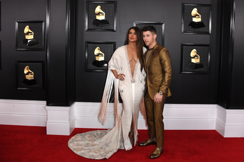 Indian actress Priyanka Chopra and US singer-songwriter Nick Jonas arrive for the 62nd Annual Grammy Awards in Los Angeles January 26, 2020. — AFP pic