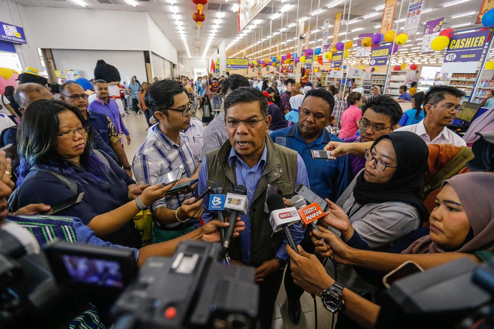 Domestic Trade and Consumer Affairs Minister Datuk Seri Saifuddin Nasution Ismail speaks to reporters at the official opening ceremony of TF Value-Mart in Balik Pulau January 9, 2020. u00e2u20acu201d Picture by Sayuti Zainudin