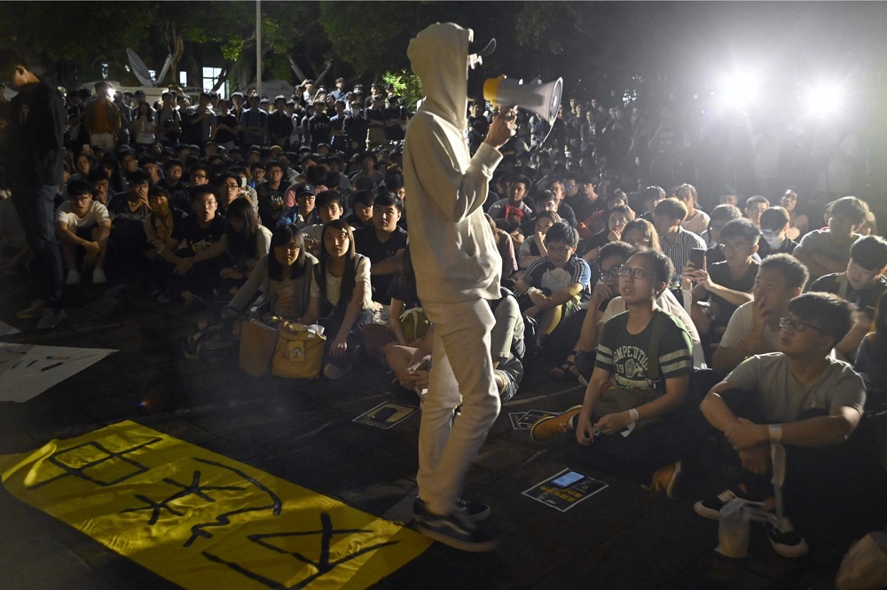 A Hong Kong student who study in Taipei speaks during a rally to support the current protests in Hong Kong, at the National Taiwan University in Taipei June 14, 2019. u00e2u20acu201d AFP pic