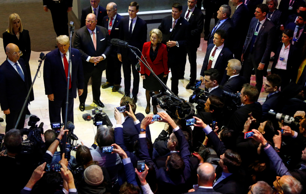 US President Donald Trump speaks to reporters next to World Economic Forum founder Klaus Schwab and his wife Hilde Schwab during the 50th World Economic Forum (WEF) annual meeting in Davos, Switzerland, January 21, 2020. u00e2u20acu201d Reuters pic 