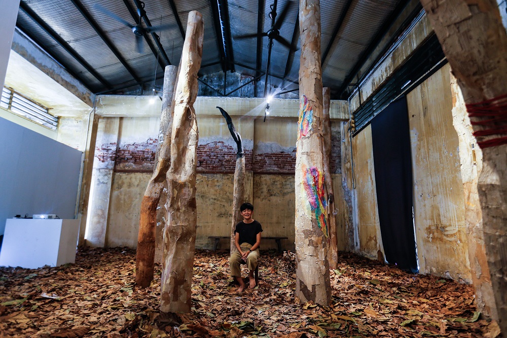 Tan Lay Heong poses with her art installation ‘A Real Fake Forest’ at the Hin Bus Depot in George Town, Penang January 22, 2020. — Picture by Sayuti Zainudin  