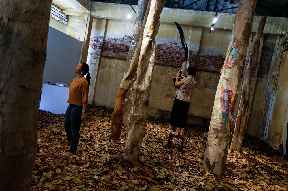 Visitors look at the art installation u00e2u20acu02dcA Real Fake Forestu00e2u20acu2122 at the Hin Bus Depot in George Town, Penang January 22, 2020. u00e2u20acu201d Picture by Sayuti Zainudin  