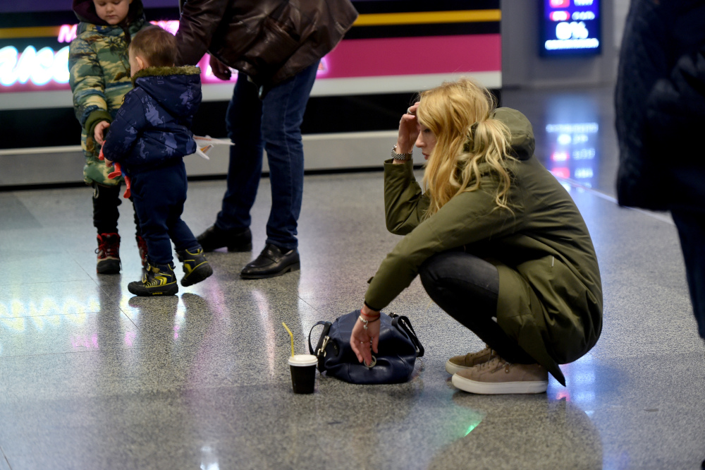 A woman reacts at the arrival gate of the Boryspil airport outside Kiev on January 8, 2020. A Ukrainian airliner carrying 176 people from seven countries crashed shortly after takeoff from Tehran January 8, 2020, killing all on board. u00e2u20acu201d AFP pic