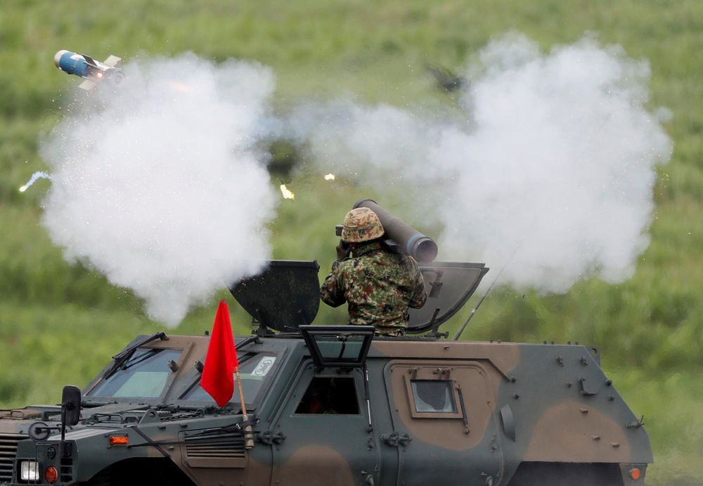 Japanese Ground Self-Defense Force soldier fires a Type 01 LMAT, man-portable fire-and-forget anti-tank missile, during an annual training session near Mount Fuji at Higashifuji training field in Gotemba, west of Tokyo, August 22, 2019. u00e2u20acu201d Reuters pic