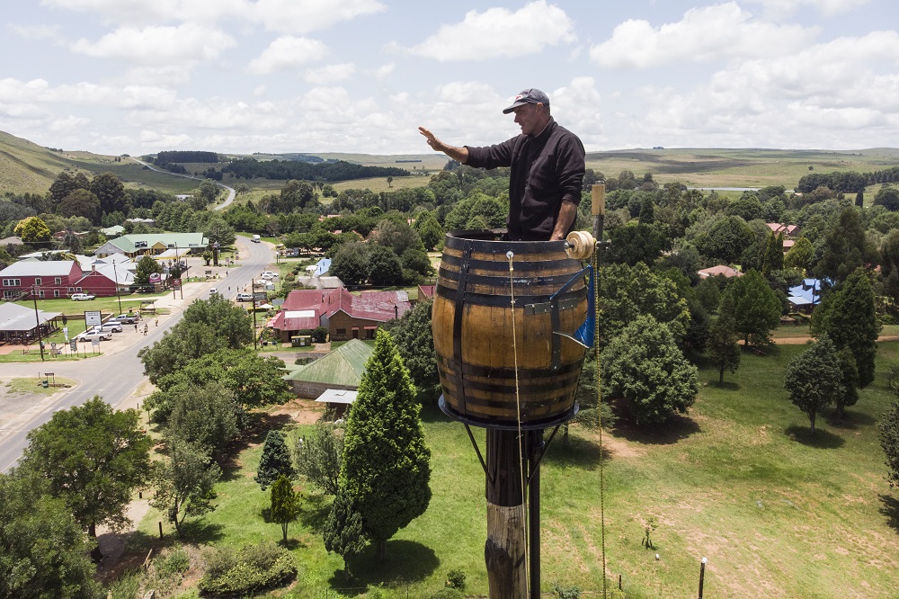 An aerial view shows Vernon Kruger, 52, gesturing while standing in a barrel at the top of a pole 25 metres above the ground in Dullstroom, South Africa January 16, 2020. u00e2u20acu201d AFP pic