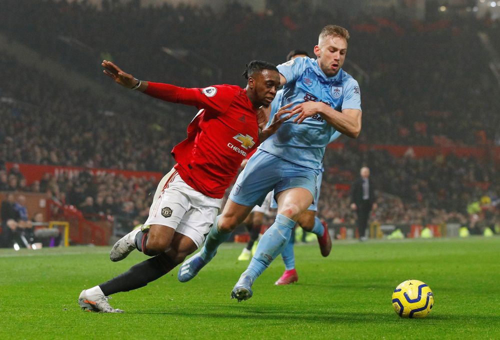 Manchester Unitedu00e2u20acu2122s Aaron Wan-Bissaka in action with Burnleyu00e2u20acu2122s Charlie Taylor at Old Trafford, January 22, 2020. u00e2u20acu201d Reuters pic