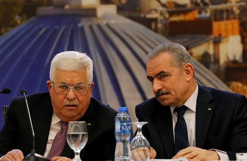 Palestinian President Mahmoud Abbas (left), with Palestinian Prime Minister Mohammad Shtayyeh next to him,  delivers a speech in Ramallah, Israeli-occupied West Bank January 28, 2020. u00e2u20acu201d Reuters pic