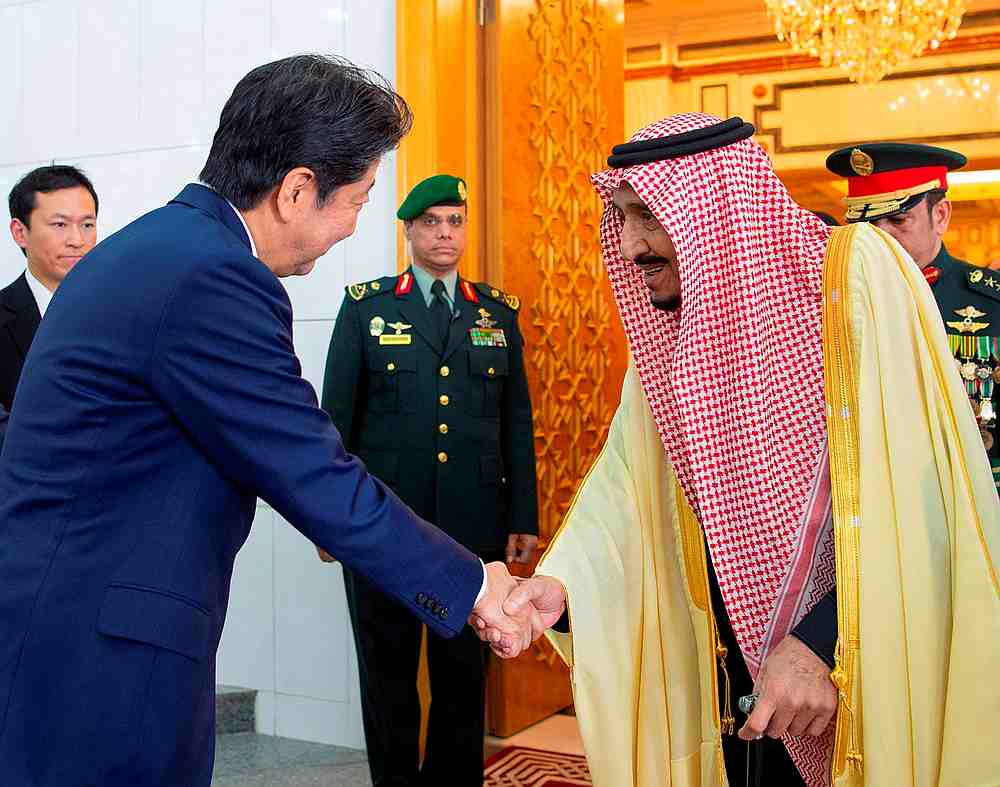 Saudi Arabia's King Salman bin Abdulaziz Al Saud shakes hands with Japanese Prime Minister Shinzo Abe during his visit in Riyadh January 12, 2020. u00e2u20acu201d Saudi Press Agency handout via Reutersn
