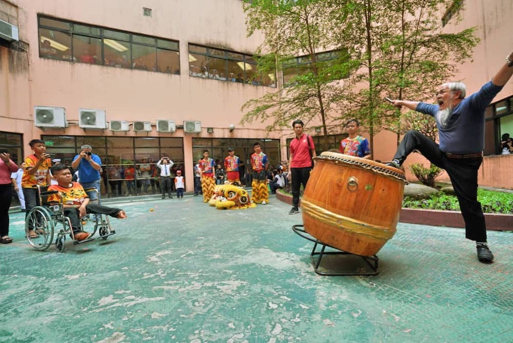 Siow (right) giving a fiery performance at the drums. — Picture courtesy of Teoh Teik Hoong