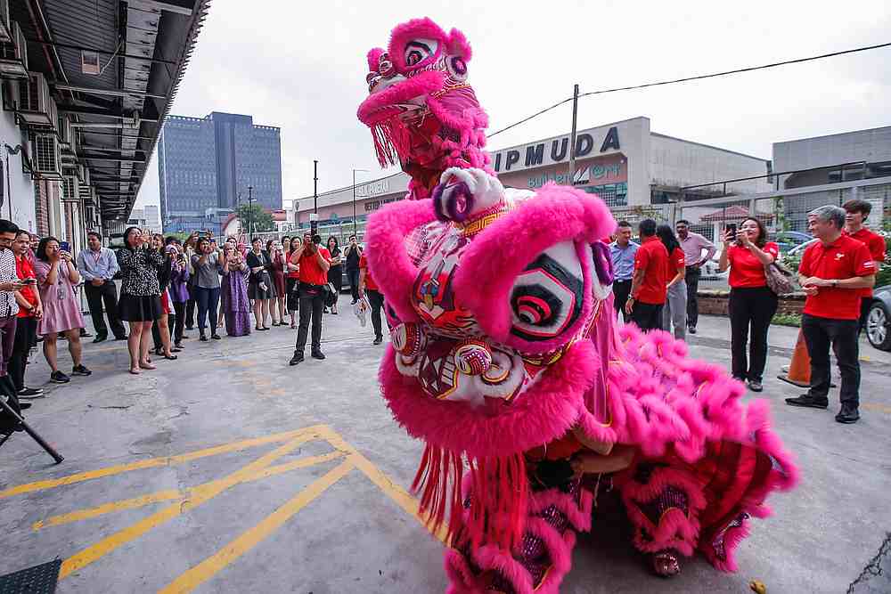 Lion dance performance courtesy of Astro Malaysia outside the Malay Mail office in Petaling Jaya. — Picture by Hari Anggara