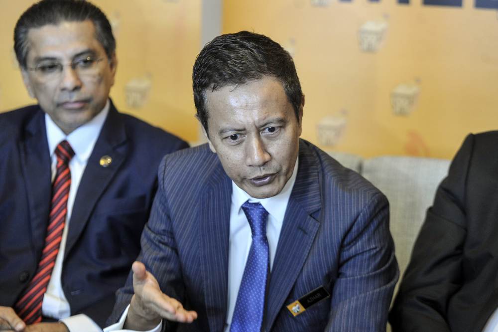 EC chairman Datuk Azhar Azizan Harun speaks to reporters in Putrajaya January 22, 2020. u00e2u20acu2022 Picture by Shafwan Zaidon