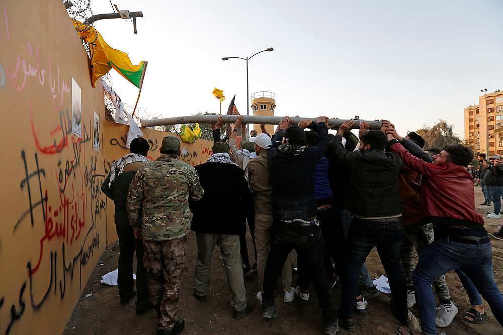 Protesters and militia fighters attack the US Embassy during a protest in Baghdad, Iraq December 31, 2019. u00e2u20acu201d Reuters pic