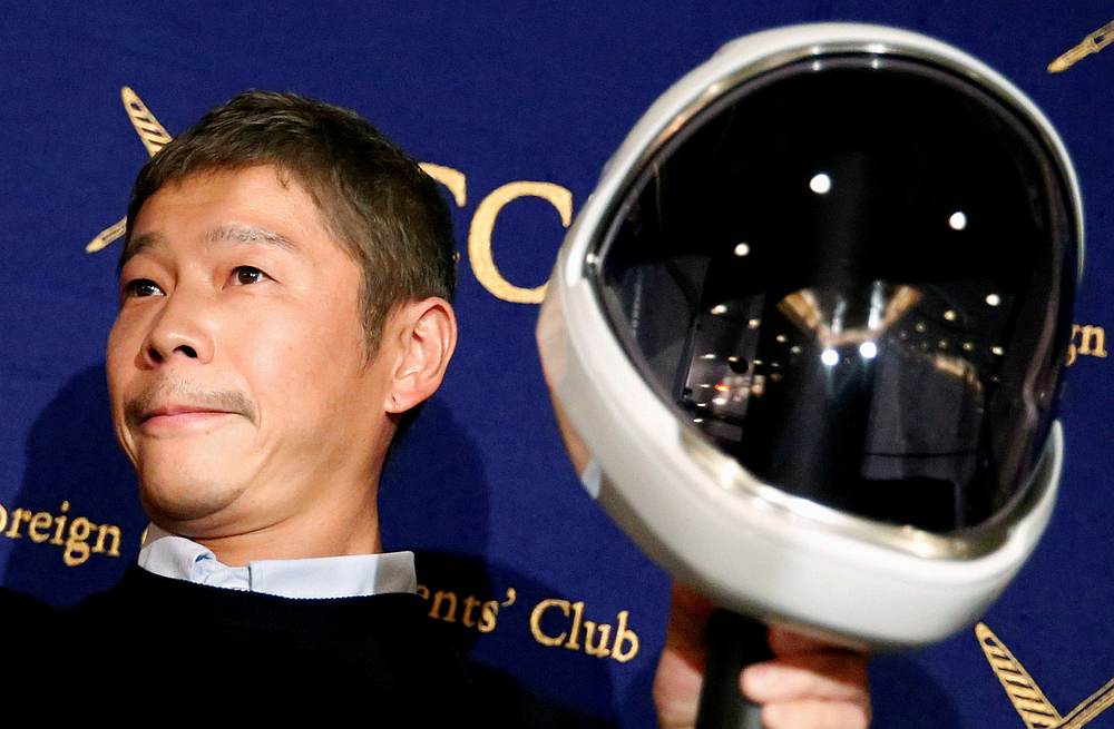 Japanese billionaire Yusaku Maezawa, founder and chief executive of online fashion retailer Zozo, poses for photos  at the Foreign Correspondents' Club of Japan in Tokyo, Japan October 9, 2018. u00e2u20acu201d Reuters pic
