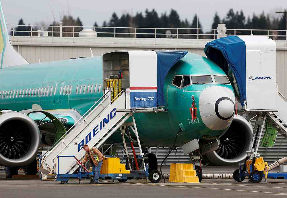 An employee works near a Boeing 737 Max aircraft at Boeing's 737 Max production facility in Renton, Washington December 16, 2019. u00e2u20acu201d Reuters pic
