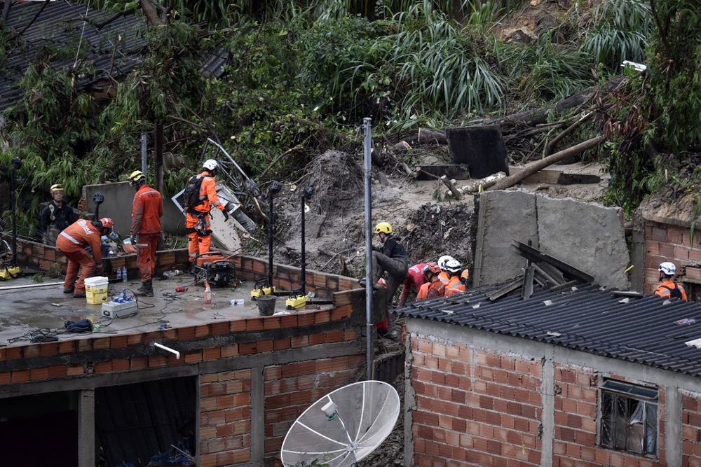 Rescue workers search for victims at two houses that collapsed due to heavy rains in Ibirite, state of Minas Gerais, Brazil, on January 24, 2020. u00e2u20acu201d AFP pic