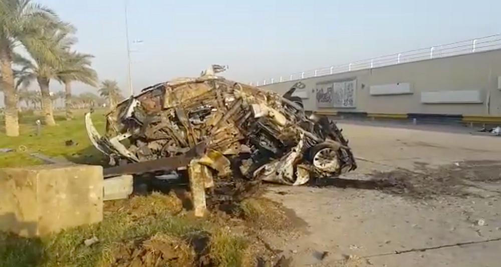 A damaged car, claimed to belong to Qassem Soleimani and Abu Mahdi al Muhandis, is seen near Baghdad International Airport, Iraq January 3, 2020. u00e2u20acu201d Ahmad Al Mukhtar/video image via Reuters