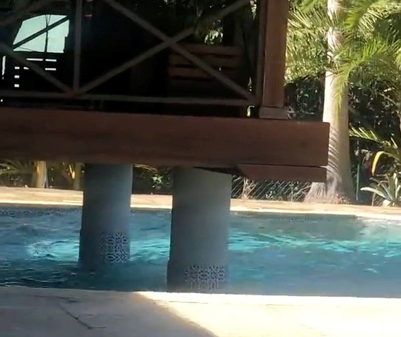 Waves splash from a pool during an earthquake in George Town, Grand Cayman, Cayman Islands January 28, 2020. u00e2u20acu201d REALVISION.COM image via Reuters