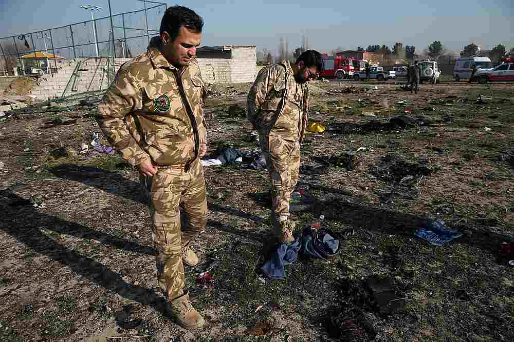 Security inspection at the site where the Ukraine International Airlines plane crashed after take-off from Iran's Imam Khomeini airport, on the outskirts of Tehran, Iran January 8, 2020. u00e2u20acu201d Wana pic via Reuters