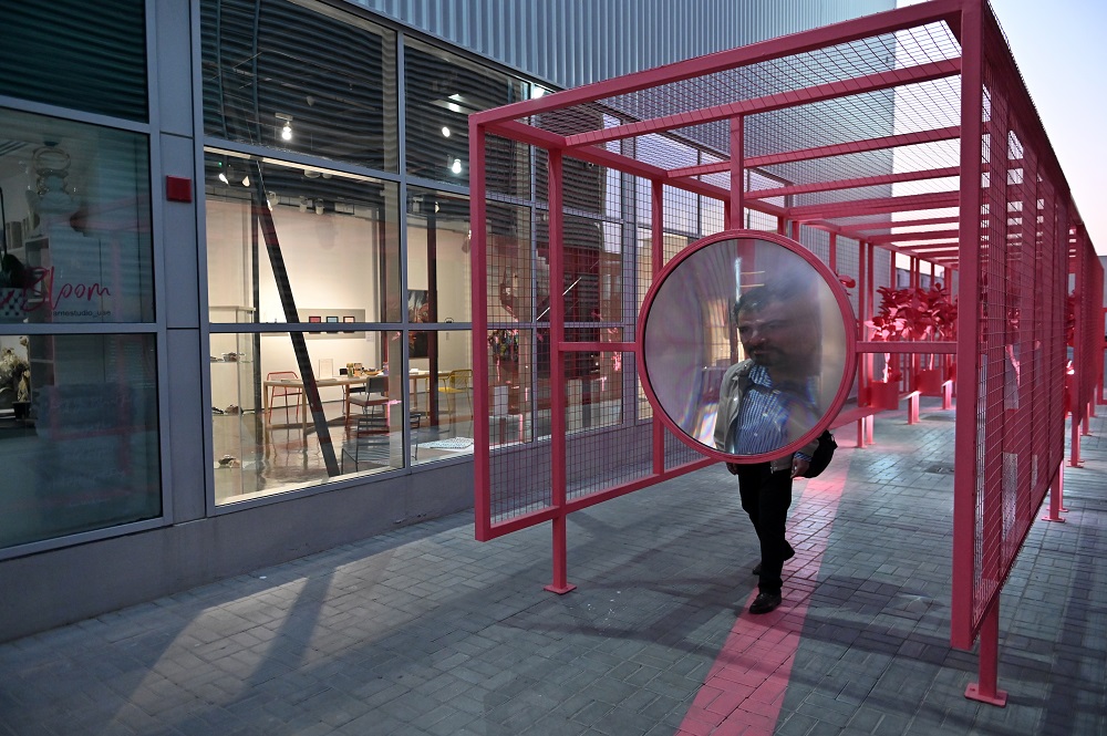 A visitor walks through an art installation by Jeddah-based architects and brothers Turki and Abdulrahman Gazzaz entiteled Absolem, at the pedestrian entrance of Alserkal Avenue in Dubai December 28, 2019. — AFP pic
