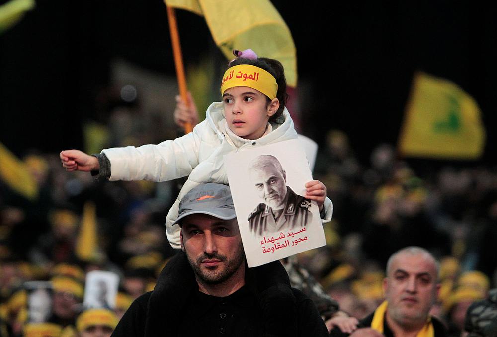 A girl holds a picture of Qassem Soleimani, who was killed in an air strike at Baghdad airport, during a funeral ceremony rally to mourn his death, in Beirut's suburbs, Lebanon, January 5, 2020. u00e2u20acu201d  Reuters pic