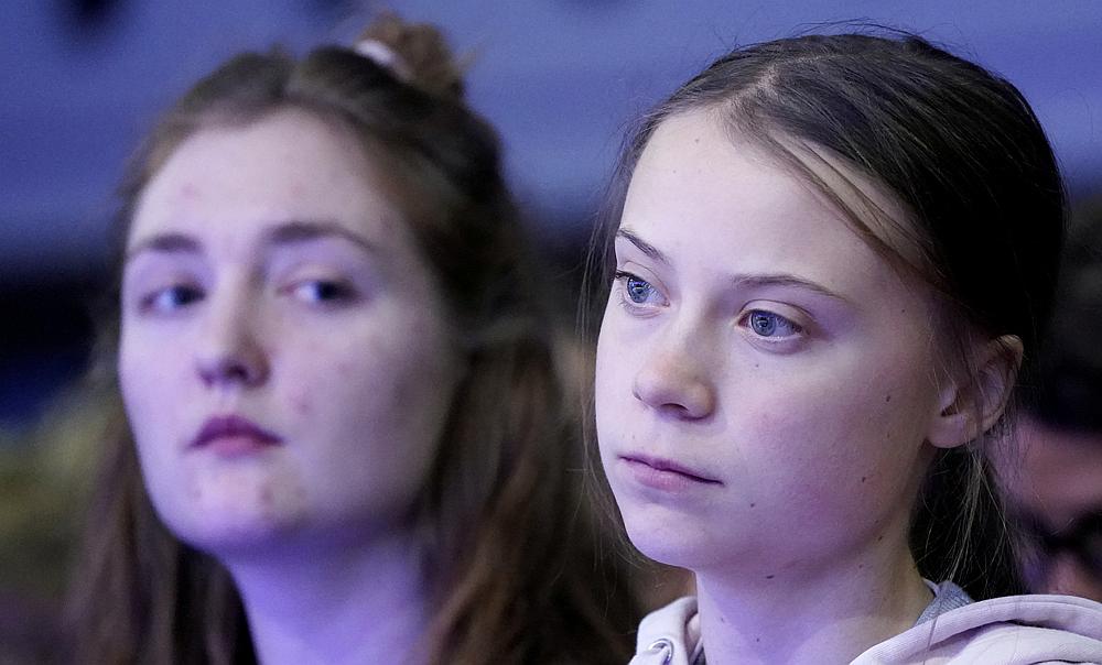 Swedish climate change activist Greta Thunberg (right) and Swiss activist Loukina Tille at the World Economic Forum in Davos, Switzerland January 21, 2020. u00e2u20acu201d Reuters pic
