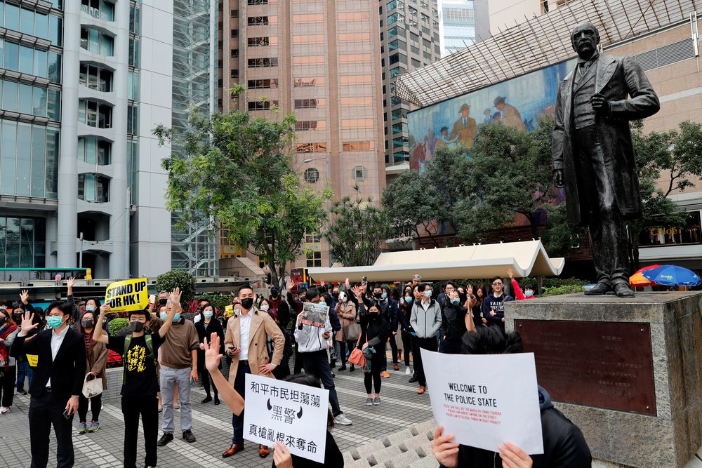 Anti-government protesters take part at a lunchtime protest outside HSBC headquarters in Hong Kong, China January 2, 2020. u00e2u20acu201d Reuters pic