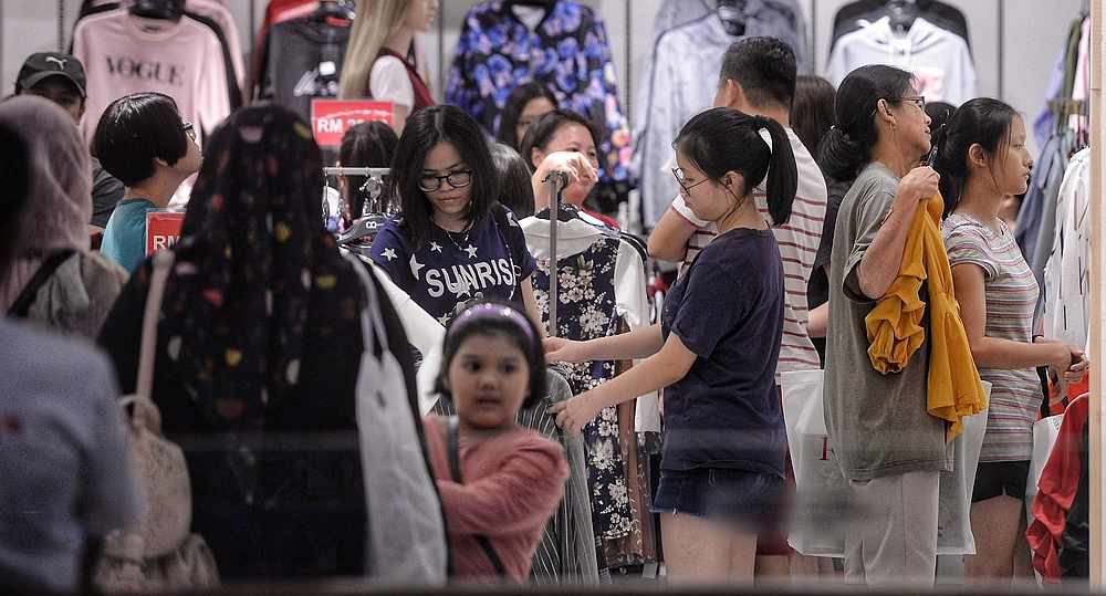 Just scroll through it on your phone via the Shopee app and get some great deals! — Picture by Shafwan Zaidon