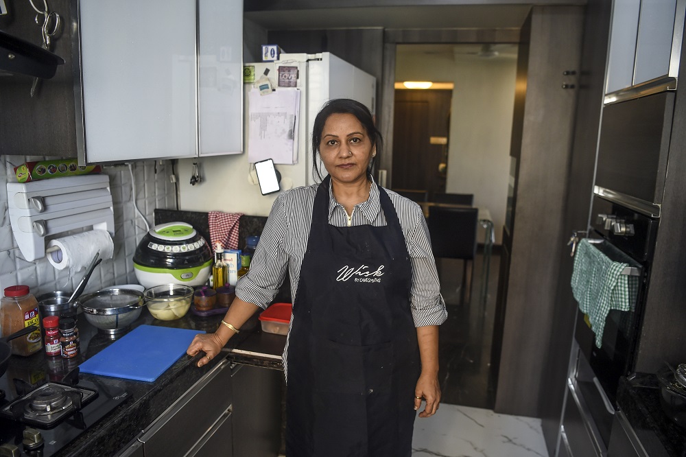 In this photo taken on January 8, 2020, home chef Rashmi Sahijwala, 59, poses for photographs in her kitchen in Mumbai. u00e2u20acu201d AFP pic