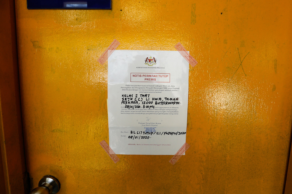 A notice of closure is seen on the door of a classroom at SJK (C) Li Hwa in Butterworth January 8, 2020. u00e2u20acu201d Picture by Sayuti Zainudin