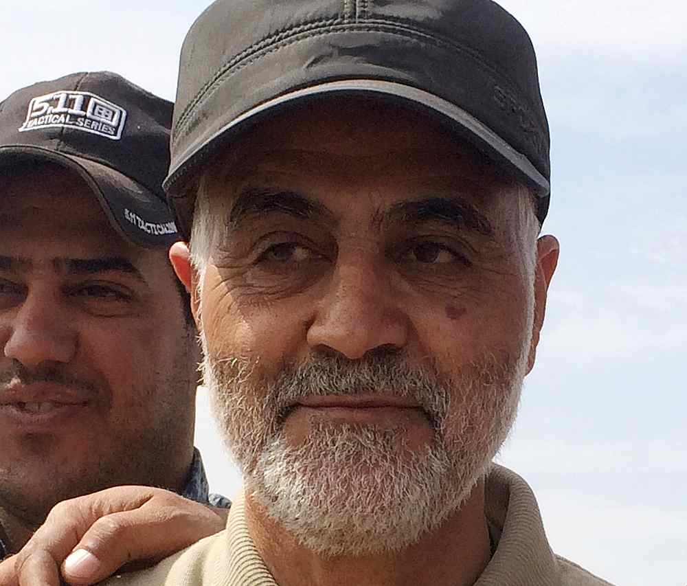 Iranian Revolutionary Guard Commander Qassem Soleimani stands at the frontline during offensive operations against Islamic State militants in the town of Tal Ksaiba in Salahuddin province March 8, 2015.  u00e2u20acu201d Reuters pic