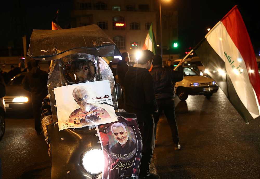 Pictures of Iranian Major-General Qassem Soleimani, who was killed in an air strike at Baghdad airport, are seen on a motorcycle, as people celebrate Iran's missile strikes, in Tehran January 8, 2020. u00e2u20acu201d Wana pic via  Reuters 
