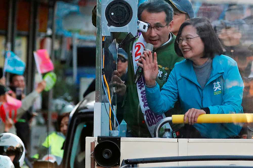 Taiwan President Tsai Ing-wen waves to supporters from a vehicle during a campaign rally ahead of the election in Taoyuan January 9, 2020. u00e2u20acu201d Reuters pic