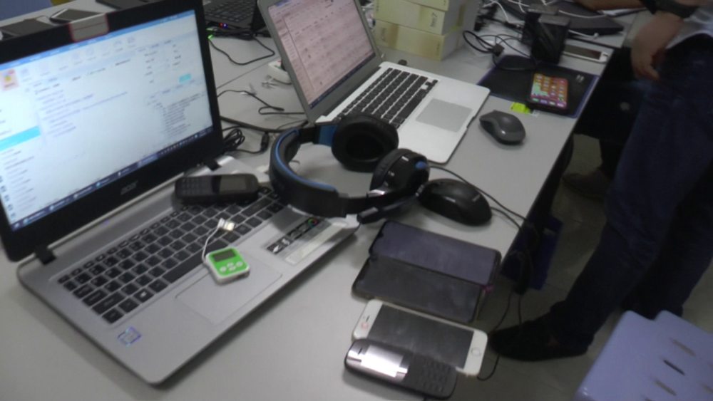 Among the equipment seized in the joint police raid on two houses that acted as an online gambling call centre targetting Chinese citizens in Taman Delima in Kluang yesterday. u00e2u20acu201d Picture courtesy of PDRM