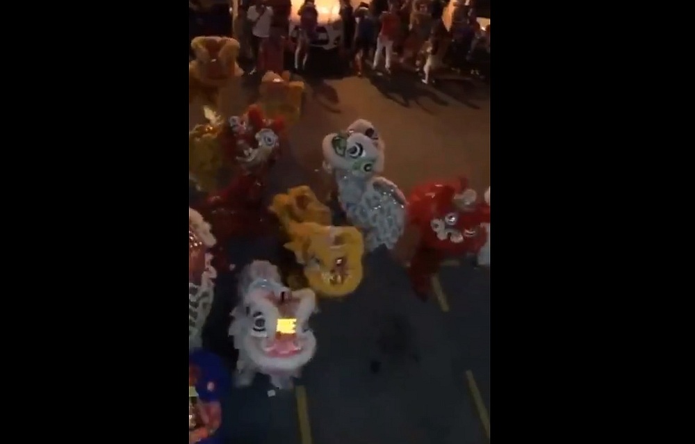 Not your traditional lion dance. u00e2u20acu201d Screengrab from Twitter/@ntsyhboo