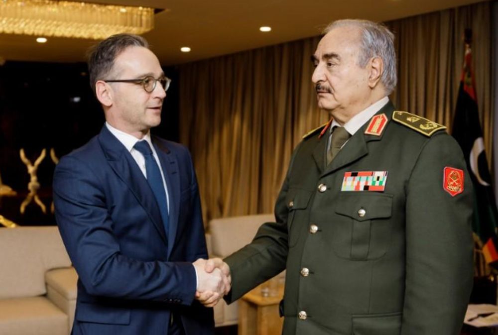 German Foreign Minister Heiko Maas shakes hands with Libyau00e2u20acu2122s commander Khalifa Haftar, in Benghazi, Libya, January 16, 2020. u00e2u20acu201d German Foreign Ministry. Auswaertiges Amt/Xander Heinl/photothek.de/handout pic via Reuters