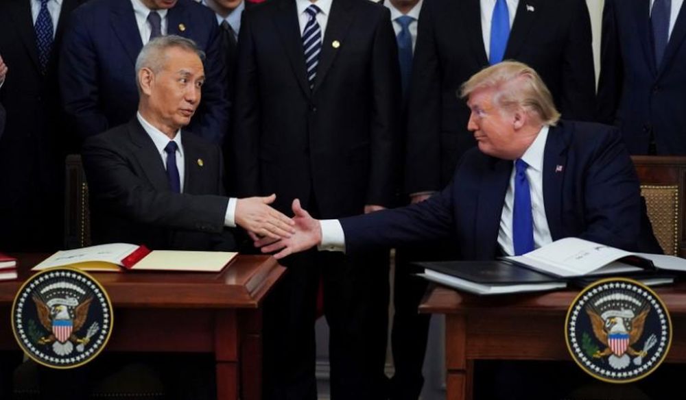 Chinese Vice Premier Liu He and US President Donald Trump shake hands after signing u00e2u20acu02dcphase oneu00e2u20acu2122 of the US-China trade agreement during a ceremony in the East Room of the White House in Washington, January 15, 2020. u00e2u20acu201d Reuters pic