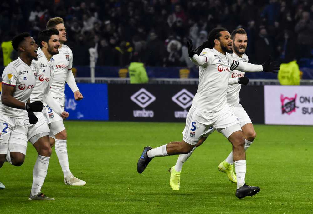 Lyon's players celebrate after winning the French League Cup semifinal football match Lille January 22, 2020. u00e2u20acu2022 AFP pic